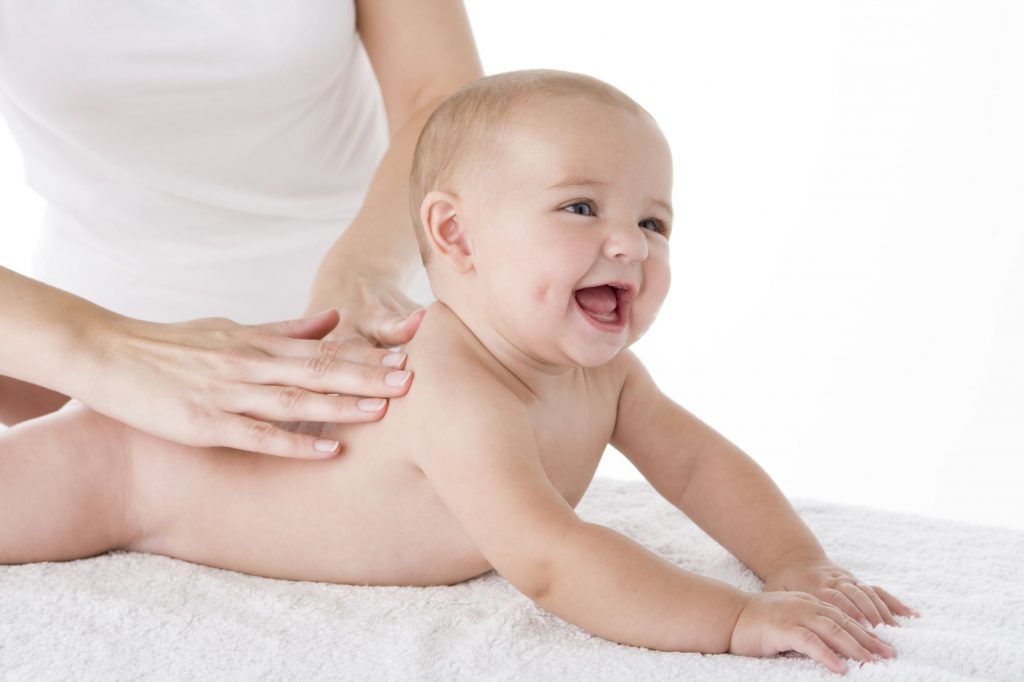 Baby receiving massage